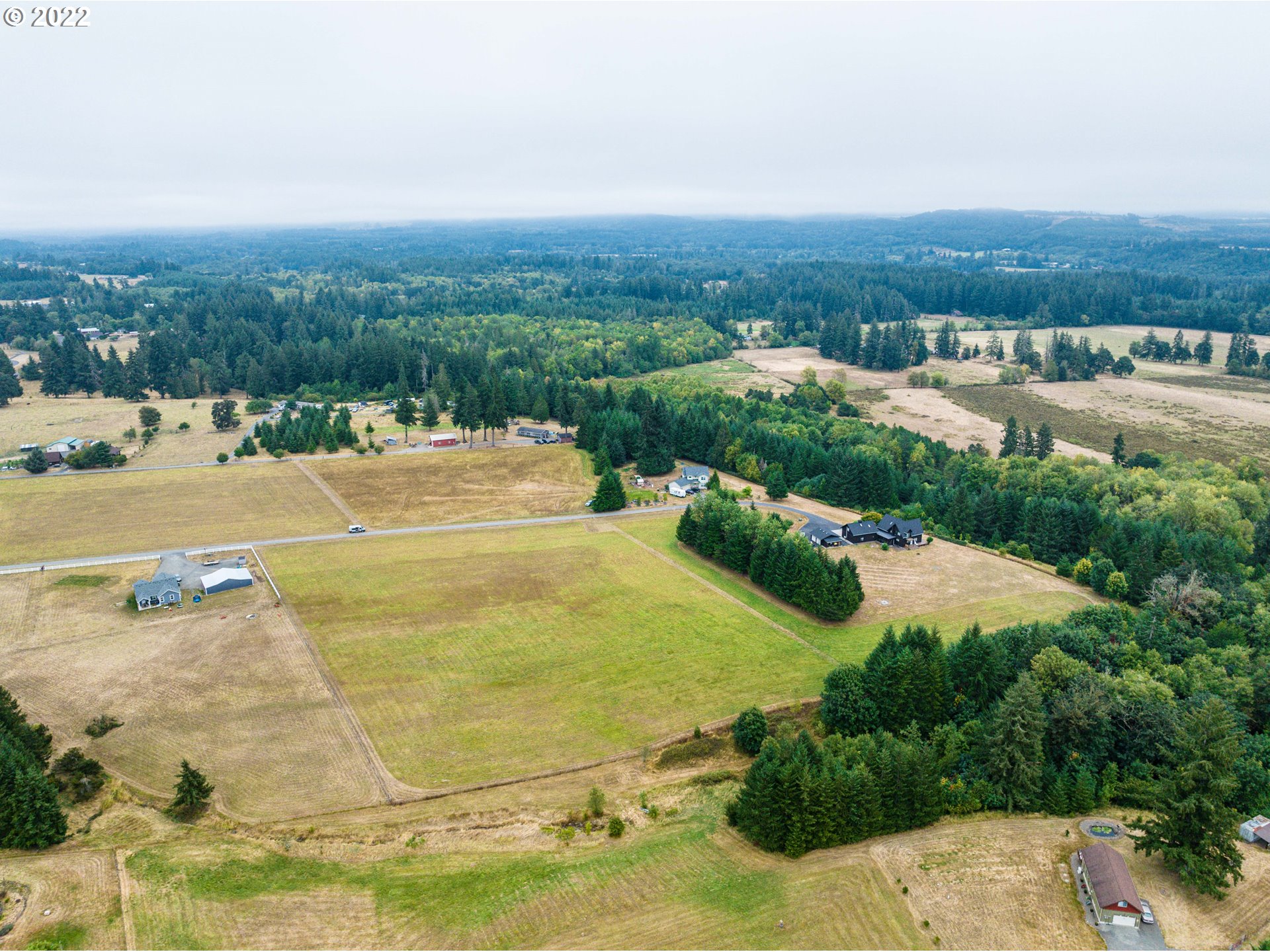 Spencer Road Toledo, WA 98591 - Photo 10 of 20 an aerial view of residential houses with outdoor space and trees