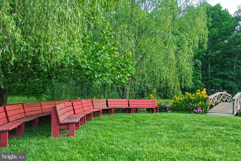 7017 Morris Road Spotsylvania, VA 22551 - Photo 11 of 23 a backyard of a house with outdoor seating