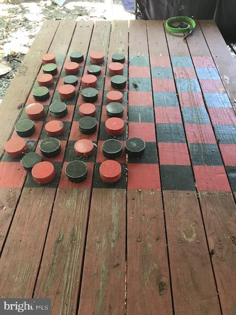 7017 Morris Road Spotsylvania, VA 22551 - Photo 22 of 23 a view of a backyard of a house with wooden floor