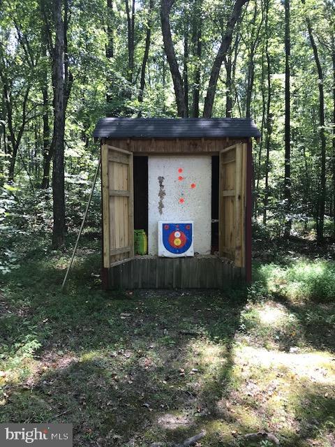 7017 Morris Road Spotsylvania, VA 22551 - Photo 23 of 23 a view of a barn in the middle of a yard