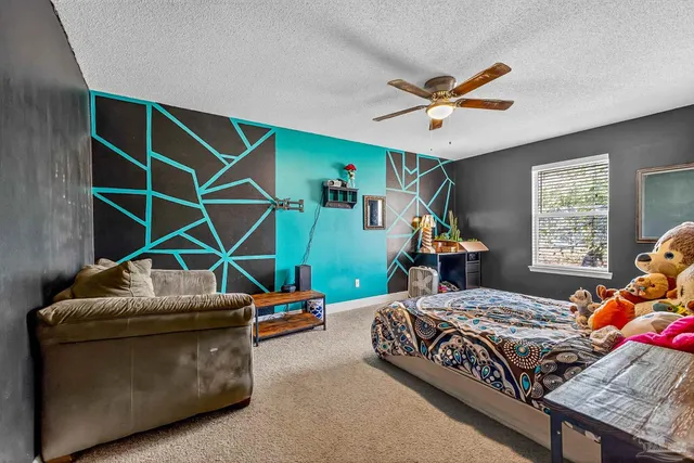 a bathroom with a bathtub sink and mirror