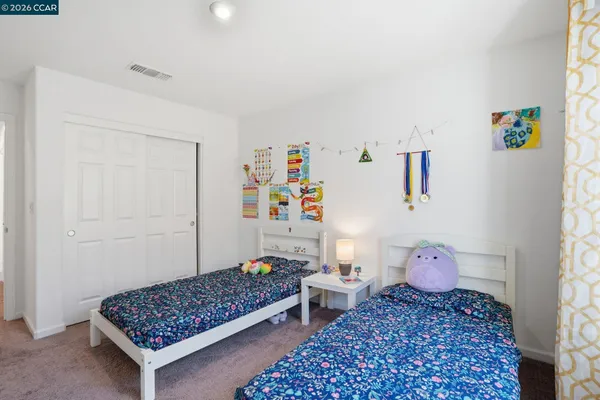 a room with toys and wooden floor