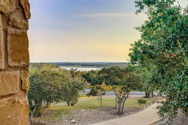 a view of a yard with an outdoor seating