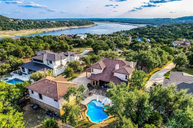an aerial view of house with yard