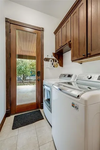 a kitchen with stainless steel appliances granite countertop a stove and a refrigerator