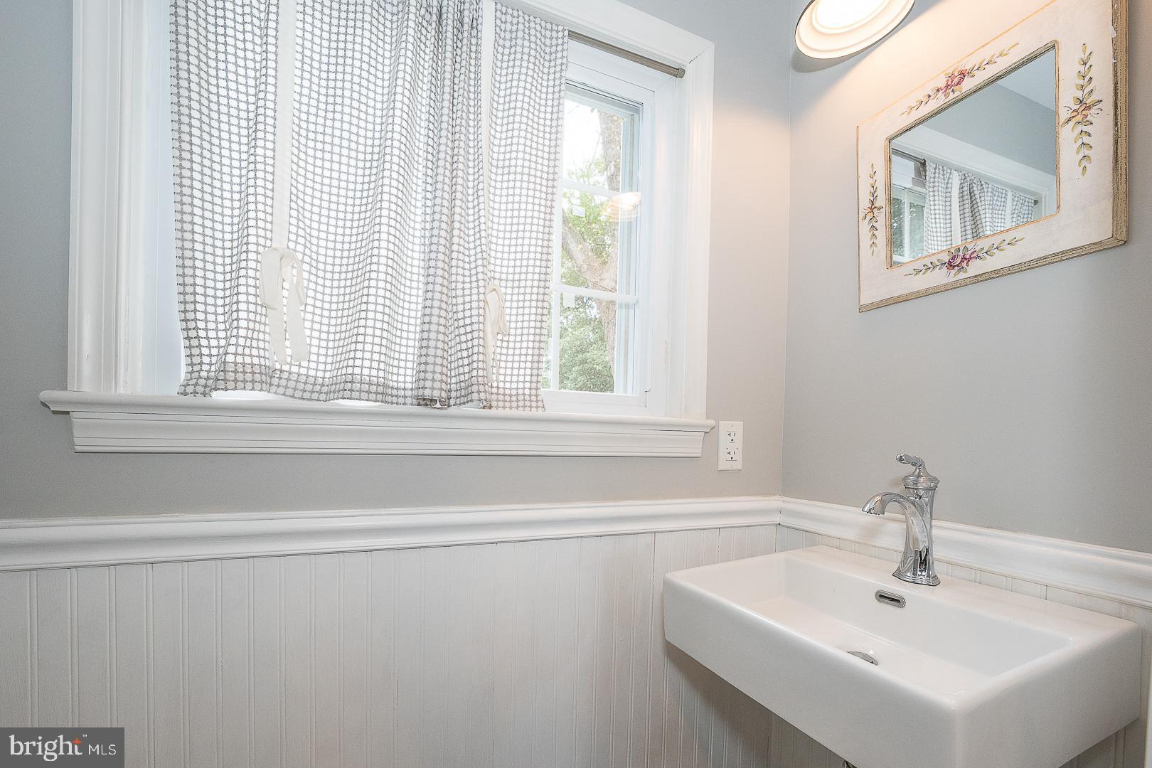 361 Summit Road Springfield, PA 19064 - Photo 15 of 42 a bathroom with a sink and a window