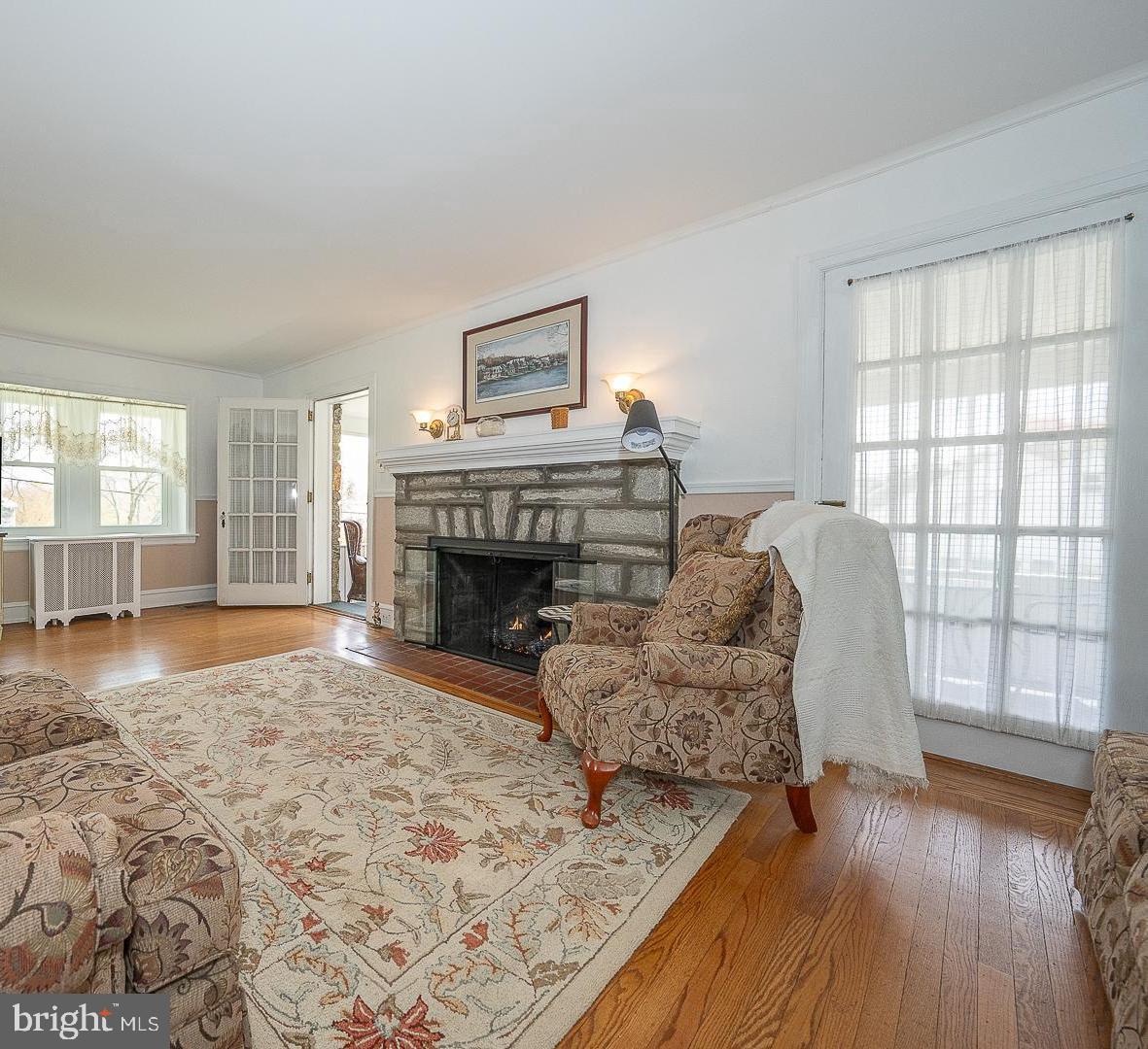 361 Summit Road Springfield, PA 19064 - Photo 17 of 42 a living room with furniture and a fireplace