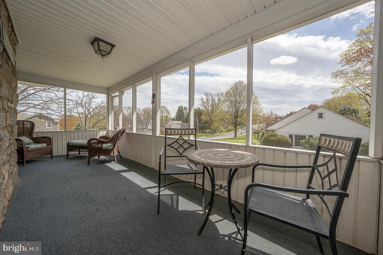 361 Summit Road Springfield, PA 19064 - Photo 18 of 42 a view of a room with gym equipment and large windows