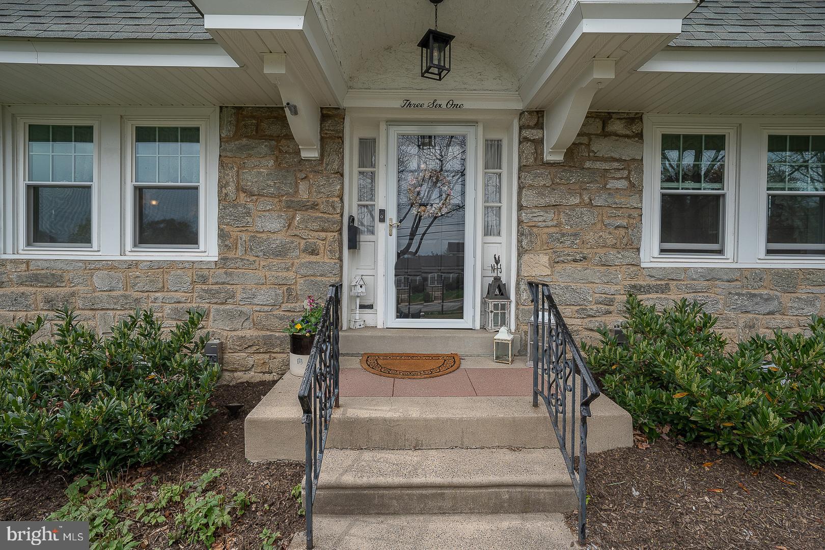 361 Summit Road Springfield, PA 19064 - Photo 4 of 42 a front view of a house with a yard