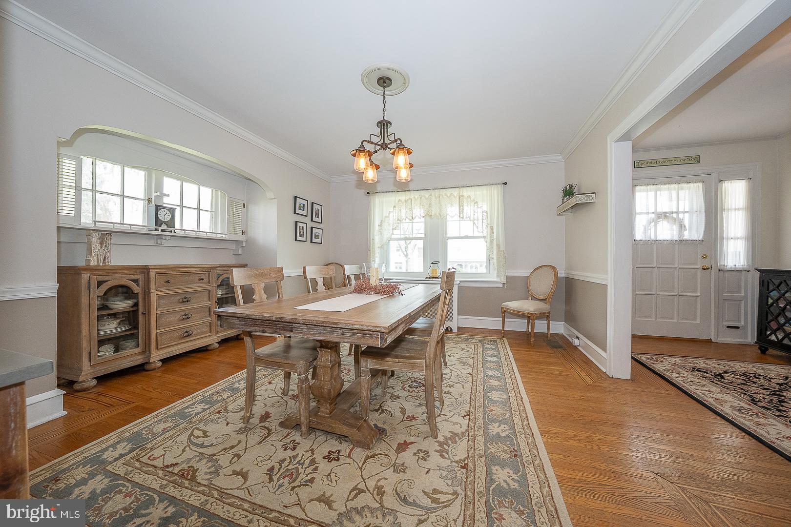 361 Summit Road Springfield, PA 19064 - Photo 6 of 42 a living room with furniture a window and a dining table