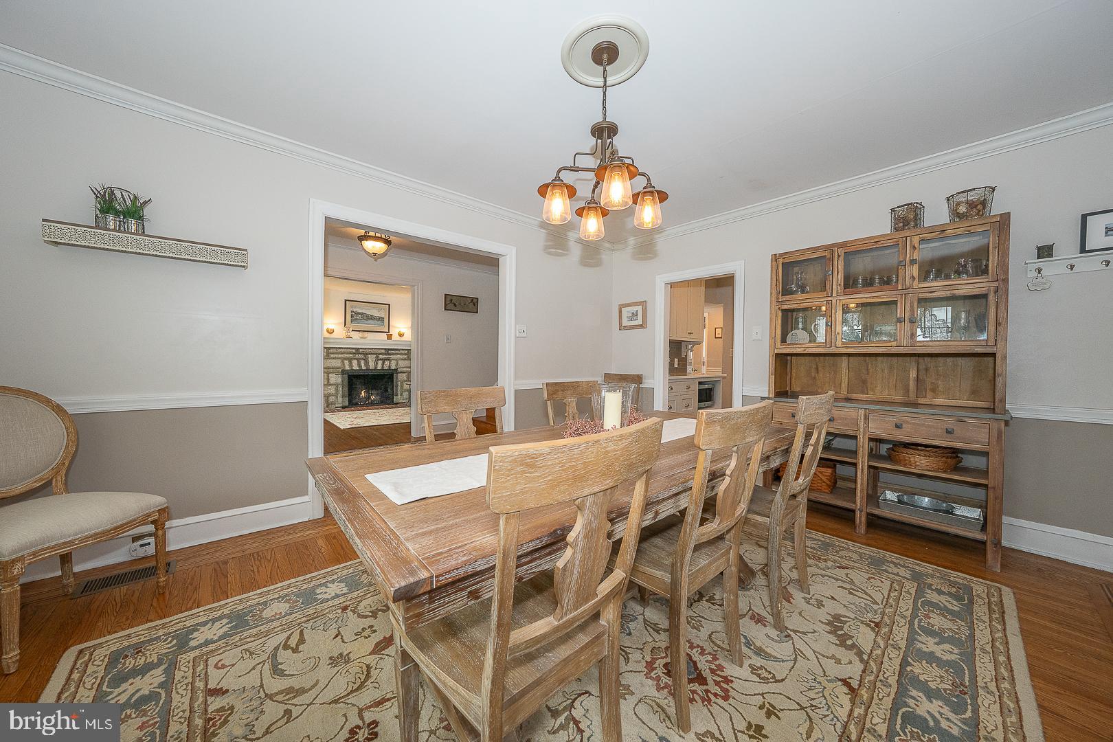 361 Summit Road Springfield, PA 19064 - Photo 8 of 42 a view of a dining room with furniture and wooden floor