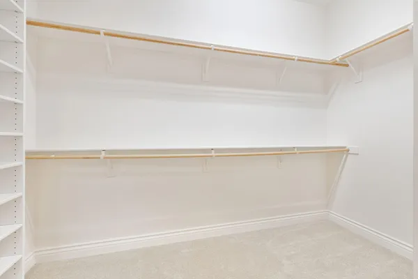 a kitchen with granite countertop a sink stainless steel appliances and cabinets