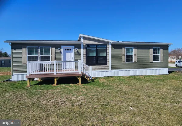 a bathroom with a sink double vanity and a mirror