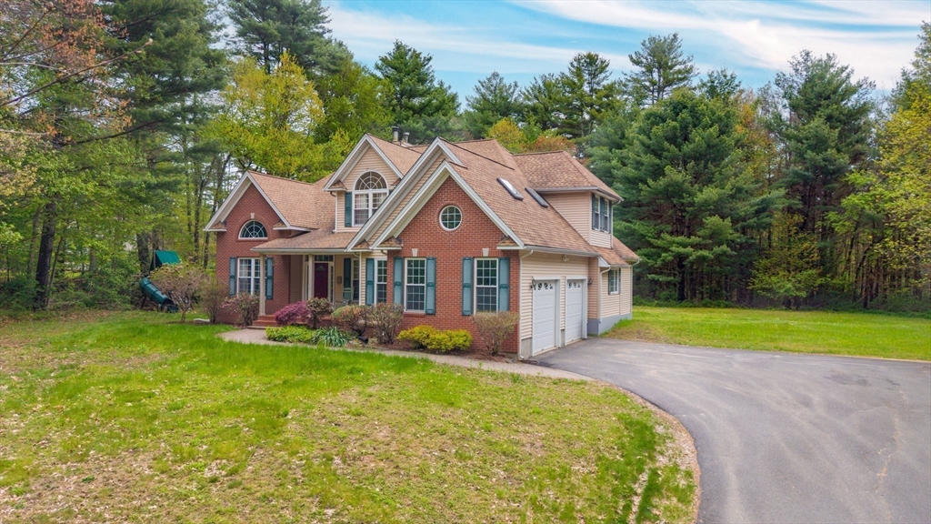 113 Greenwich Plains Road Ware, MA 01082 - Photo 2 of 42 a front view of a house with garden