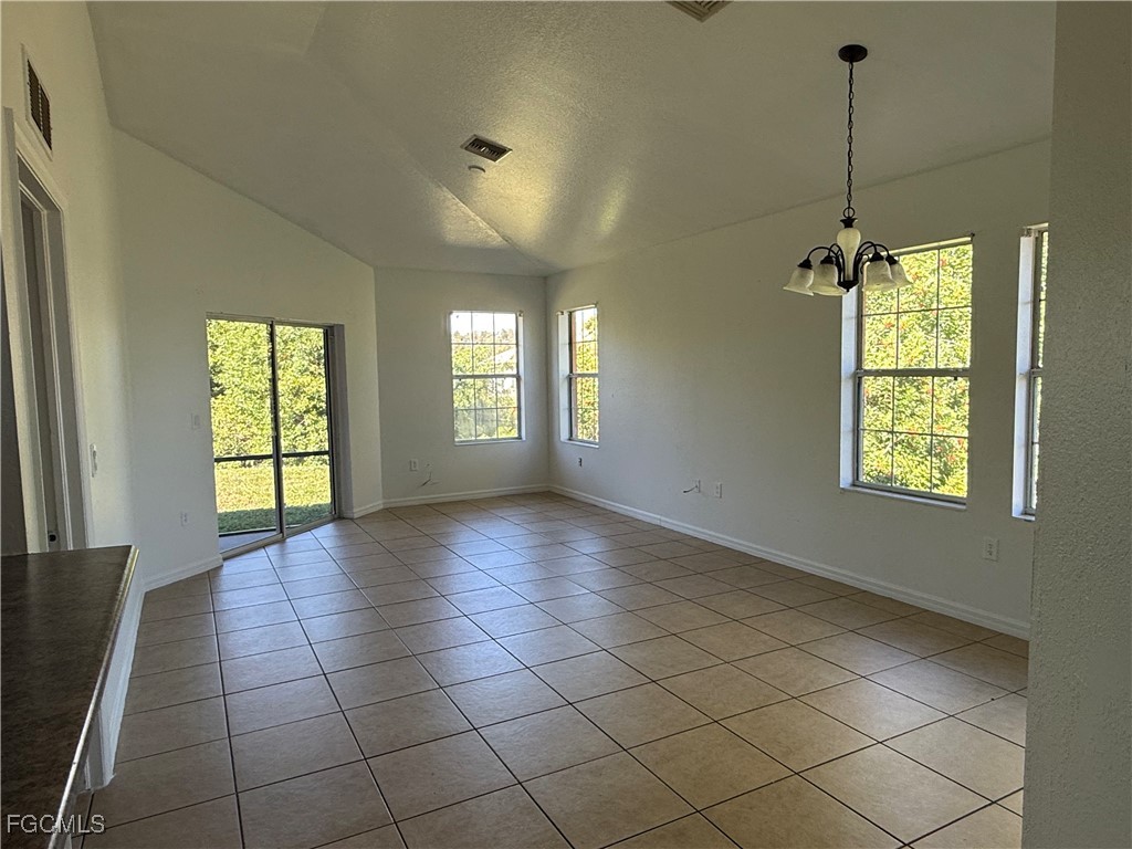 633 Alabama Road South, Unit 635 Lehigh Acres, FL 33974 - Photo 14 of 19 a view of an empty room with a window