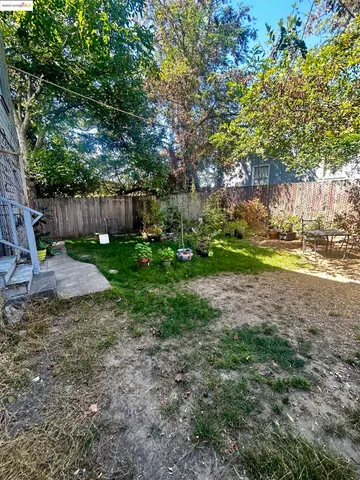 a view of backyard with green space