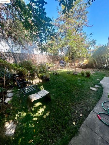 a view of a yard with large trees