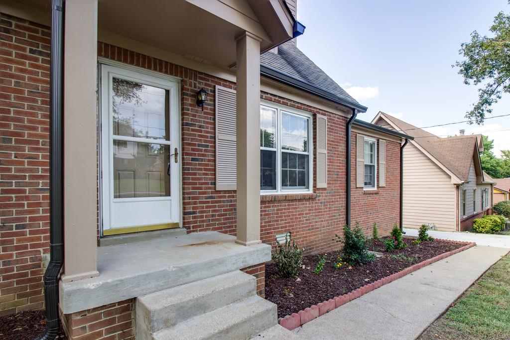 3280 Anderson Road Antioch, TN 37013 - Photo 1 of 30 a front view of a house with garden