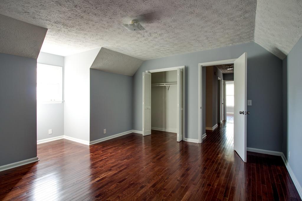 3280 Anderson Road Antioch, TN 37013 - Photo 14 of 30 an empty room with wooden floor and closet