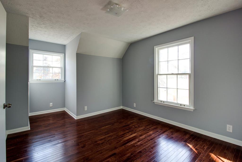3280 Anderson Road Antioch, TN 37013 - Photo 17 of 30 an empty room with wooden floor and windows