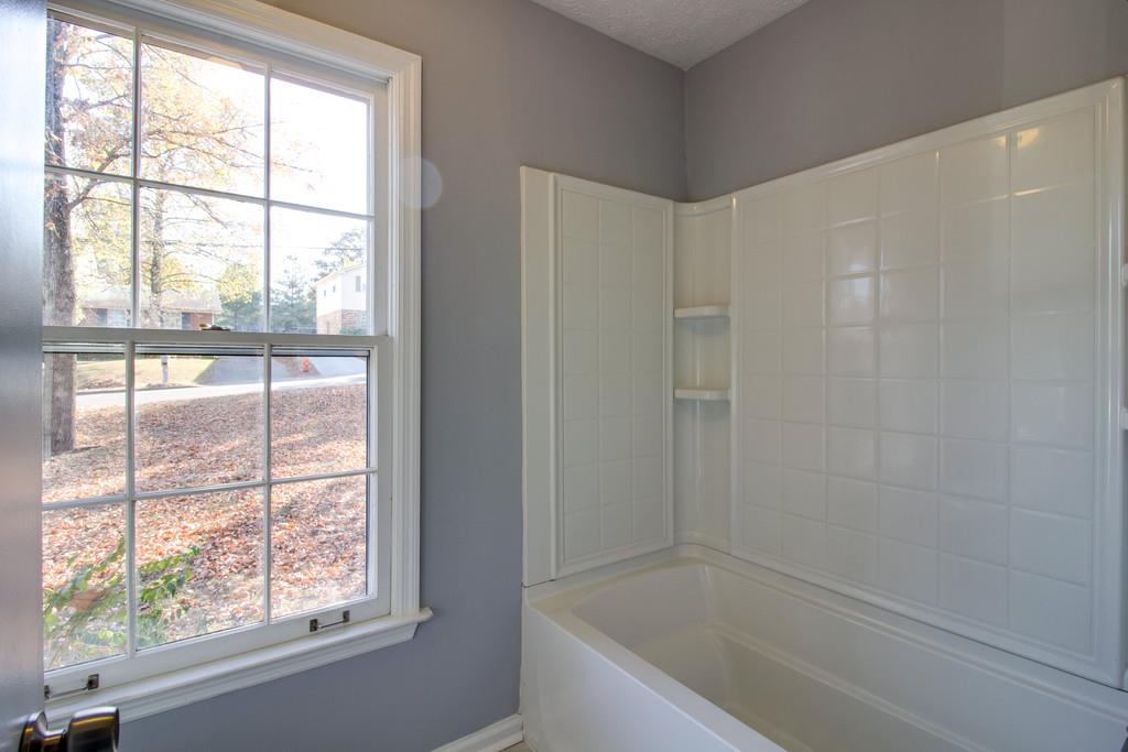 3280 Anderson Road Antioch, TN 37013 - Photo 18 of 30 a bathroom with a bathtub and window