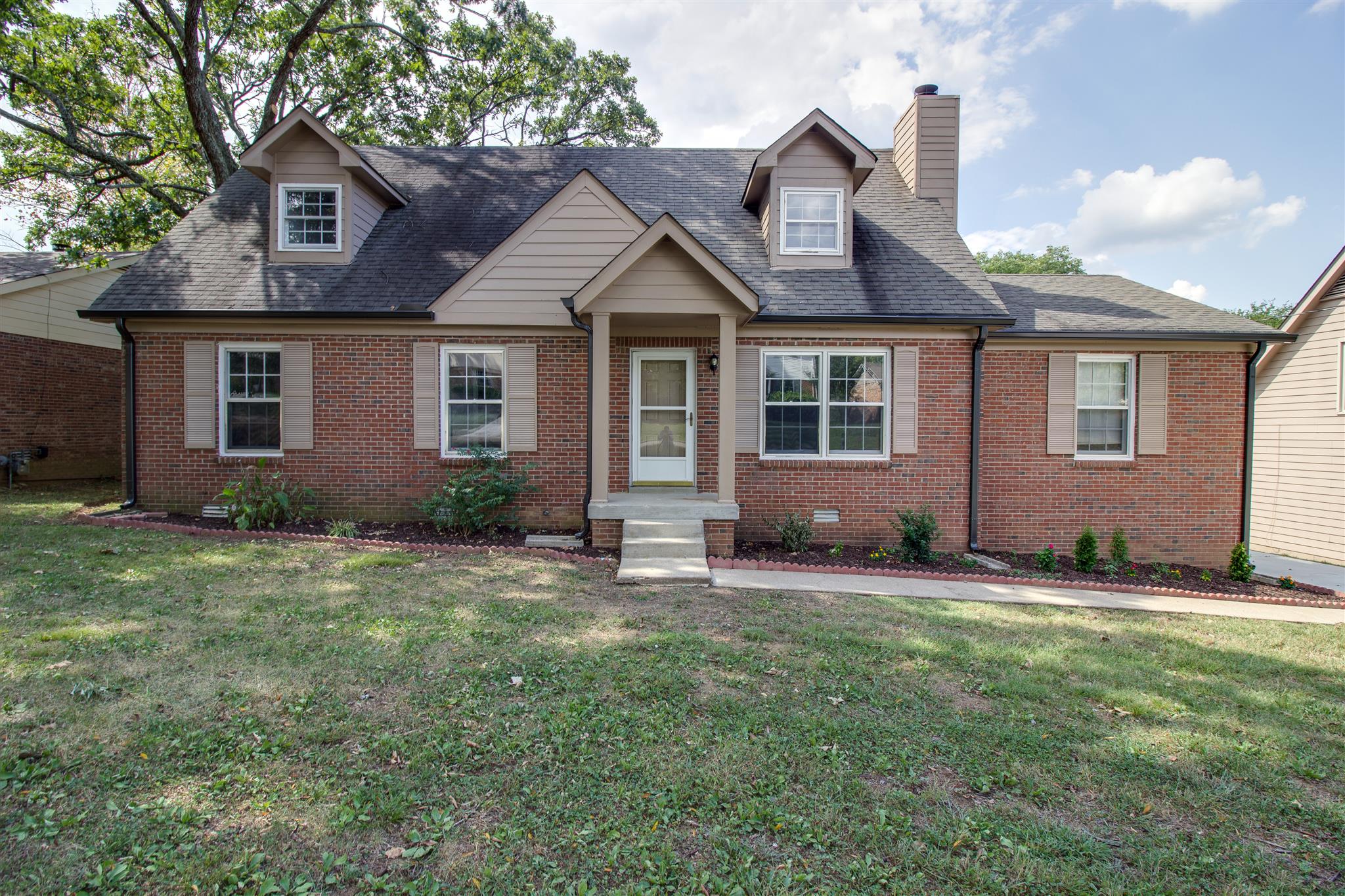 3280 Anderson Road Antioch, TN 37013 - Photo 24 of 30 a front view of a house with a yard