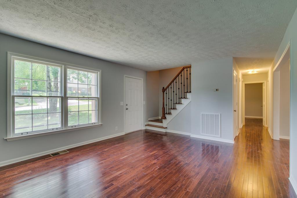 3280 Anderson Road Antioch, TN 37013 - Photo 3 of 30 wooden floor in an empty room with a window