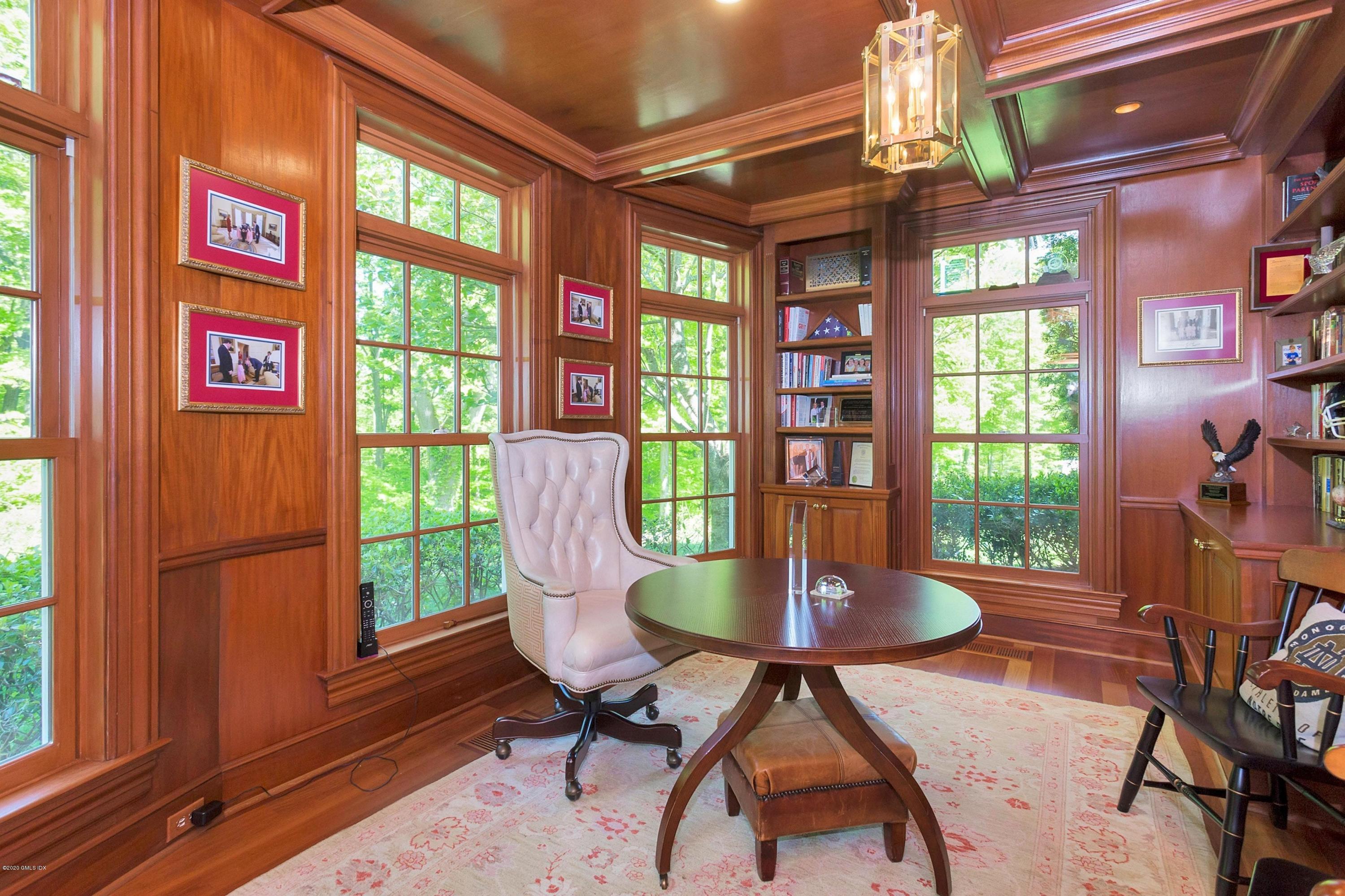 122 Butternut Hollow Road Greenwich, CT 06830 - Photo 14 of 36 a view of a dining room with furniture window and outside view