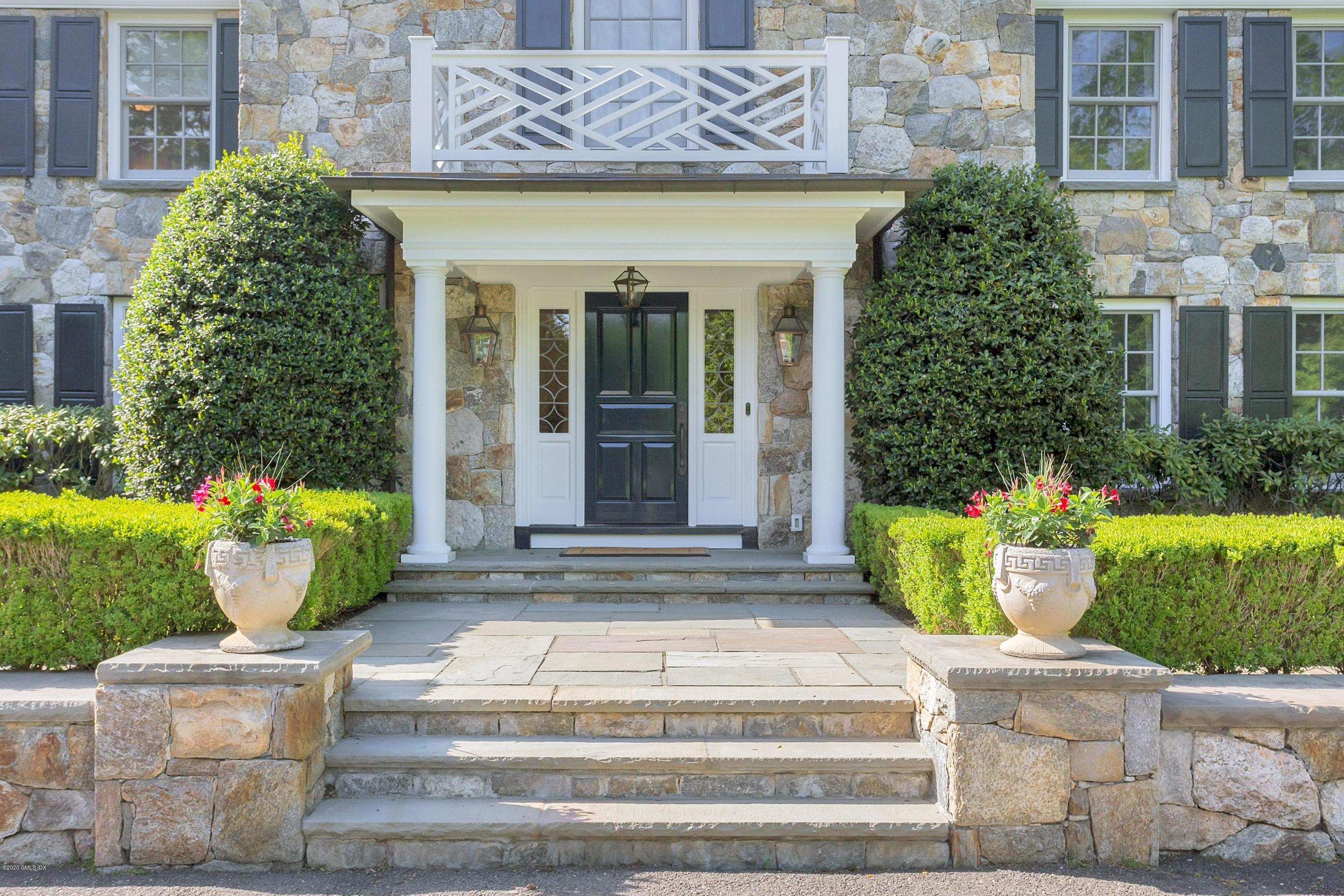 122 Butternut Hollow Road Greenwich, CT 06830 - Photo 4 of 36 a front view of a house