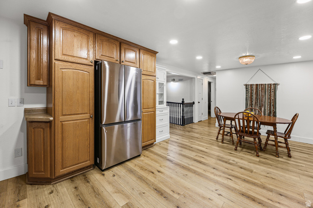822 Pinewood Circle Price, UT 84501 - Photo 11 of 49 Expansive kitchen and dining area featuring wood-finish flooring