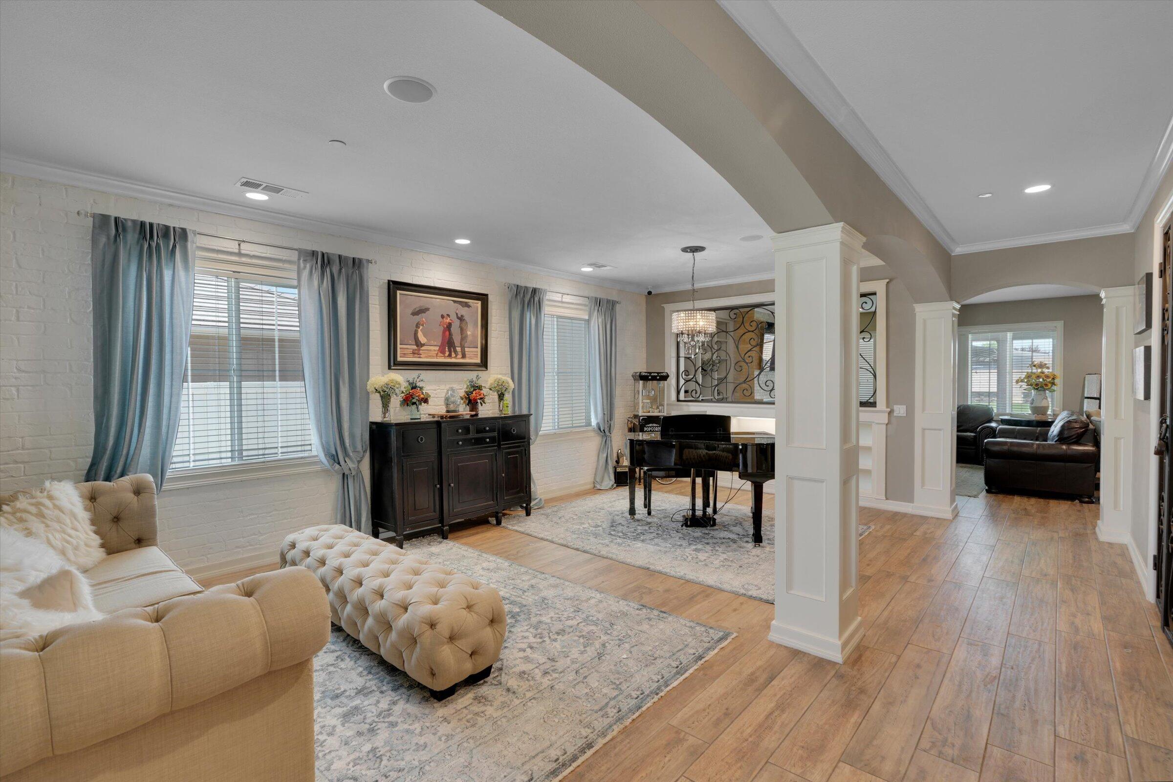 1635 Whitlatch Drive Lancaster, CA 93535 - Photo 18 of 58 a living room with furniture and a wooden floor