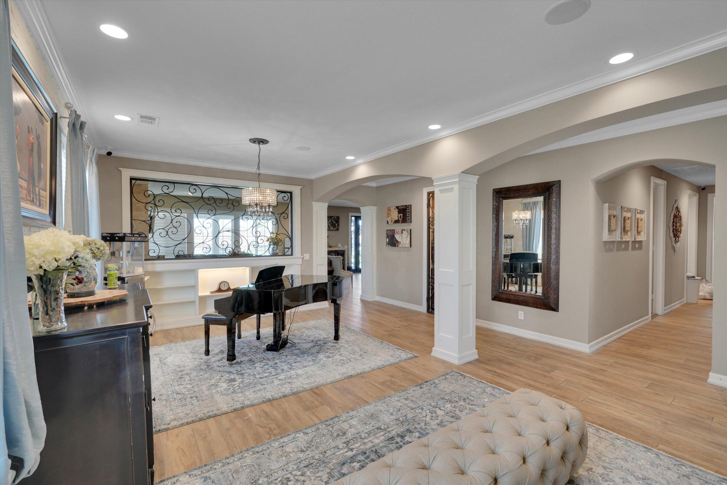 1635 Whitlatch Drive Lancaster, CA 93535 - Photo 20 of 58 a living room with furniture and a flat screen tv