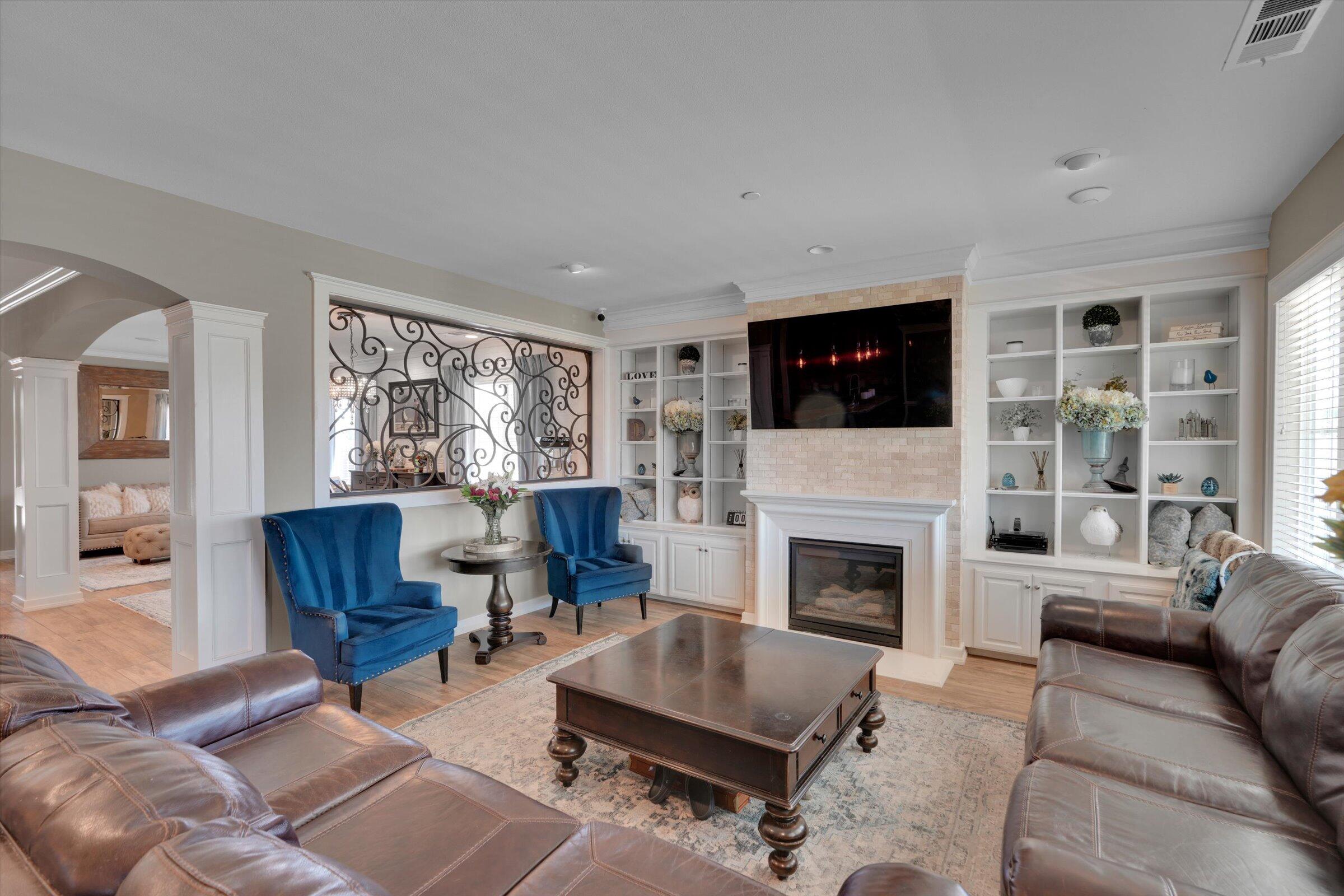 1635 Whitlatch Drive Lancaster, CA 93535 - Photo 26 of 58 a living room with furniture fireplace and flat screen tv