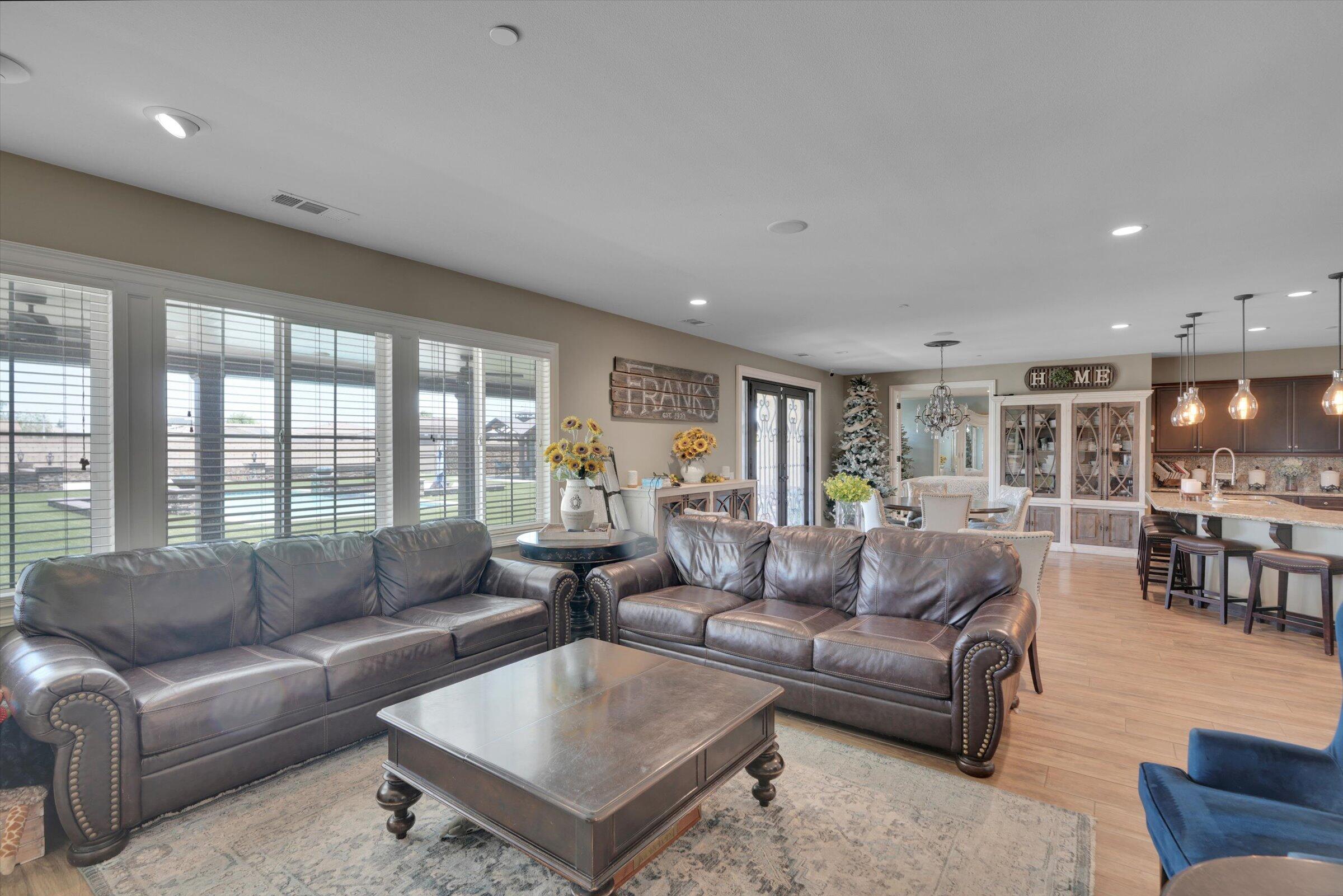1635 Whitlatch Drive Lancaster, CA 93535 - Photo 27 of 58 a living room with furniture and a large window