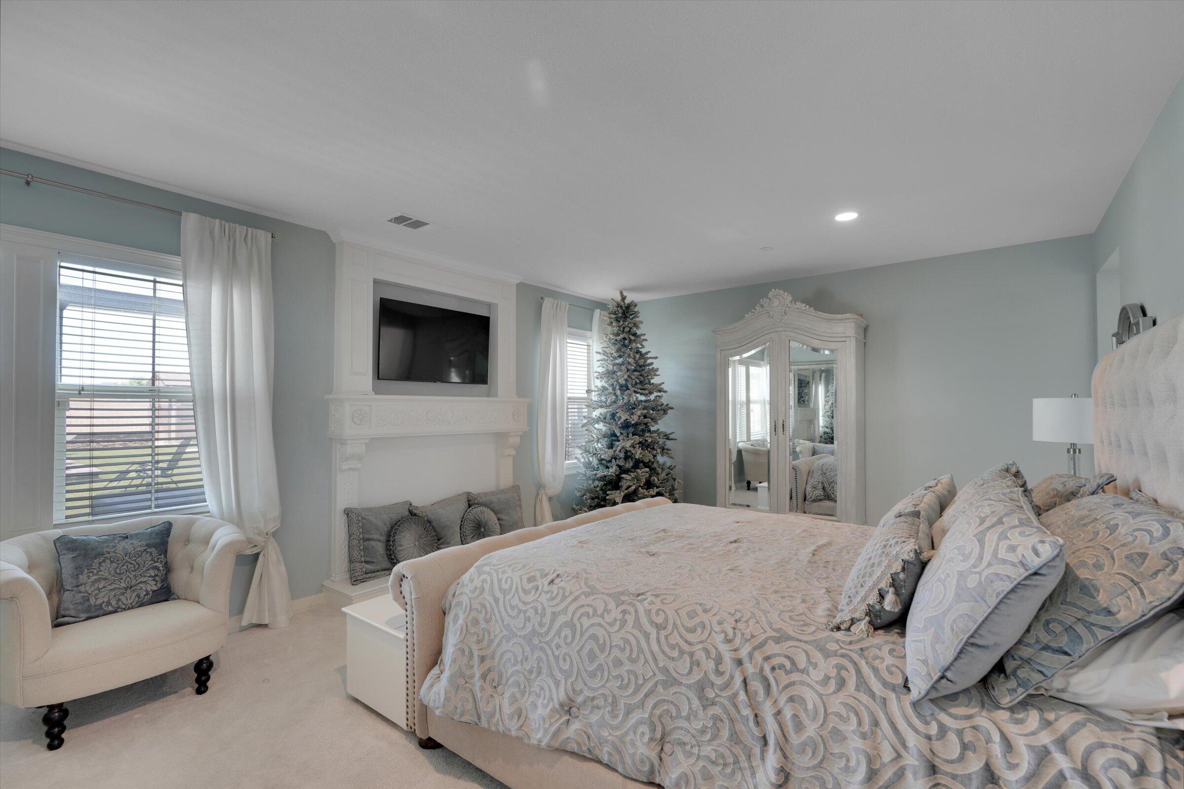 1635 Whitlatch Drive Lancaster, CA 93535 - Photo 30 of 58 a bedroom with a bed and a couch