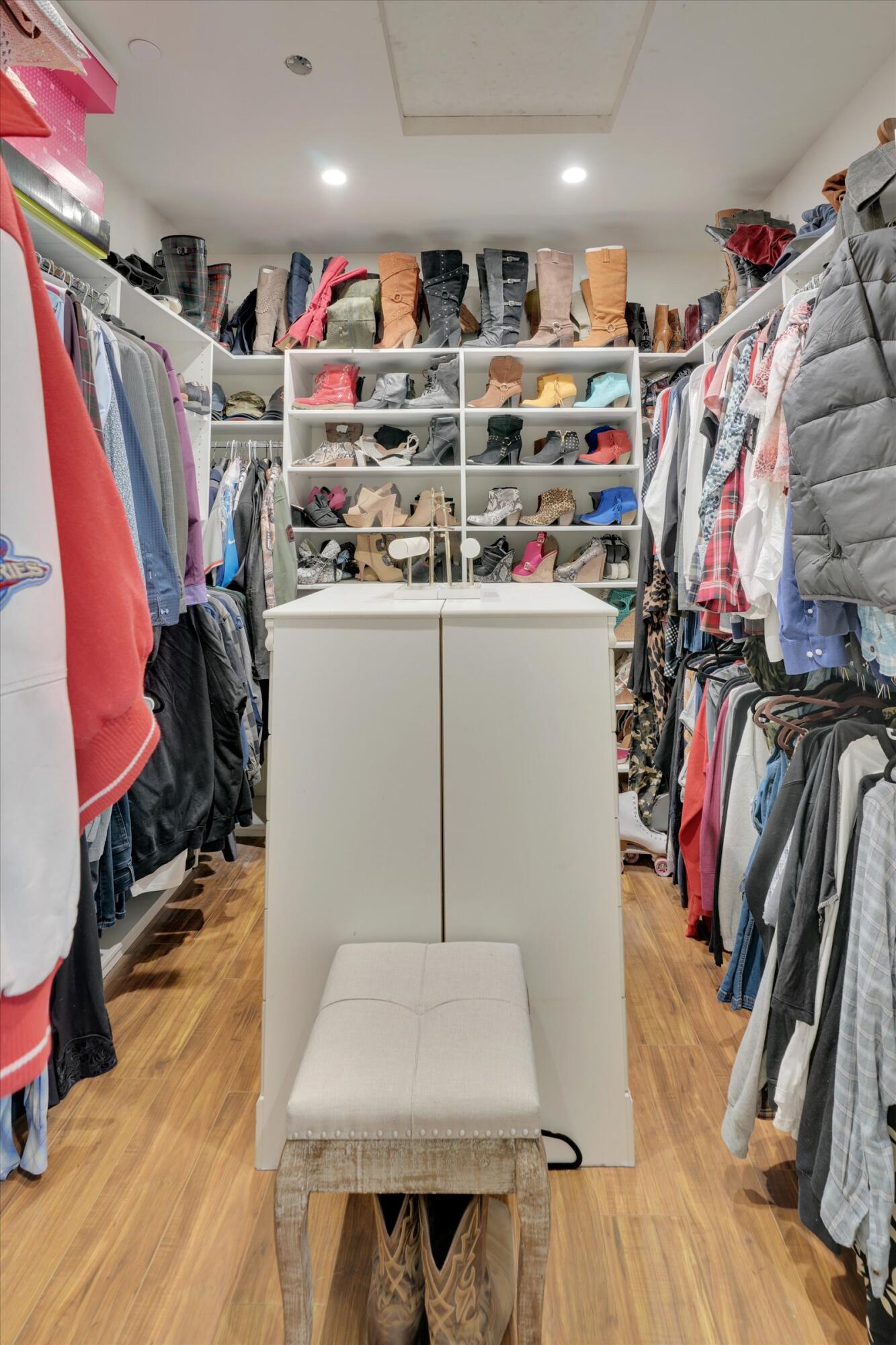 1635 Whitlatch Drive Lancaster, CA 93535 - Photo 37 of 58 a view of walk in closet with clothes and shoes