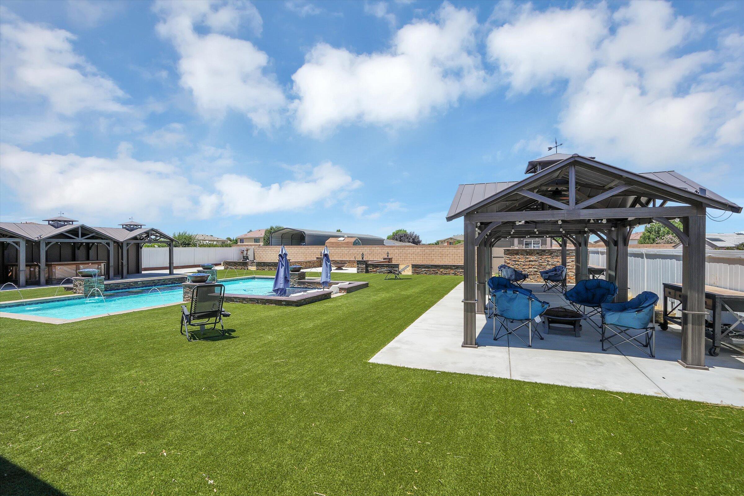 1635 Whitlatch Drive Lancaster, CA 93535 - Photo 42 of 58 a view of a house with swimming pool and sitting area