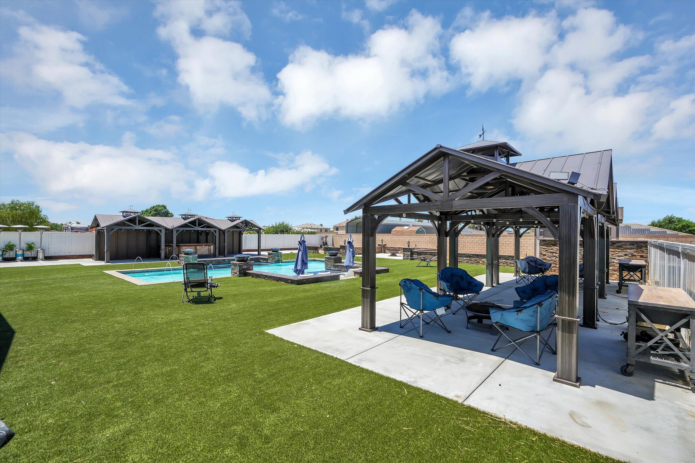 1635 Whitlatch Drive Lancaster, CA 93535 - Photo 43 of 58 a view of a house with backyard garden and sitting area