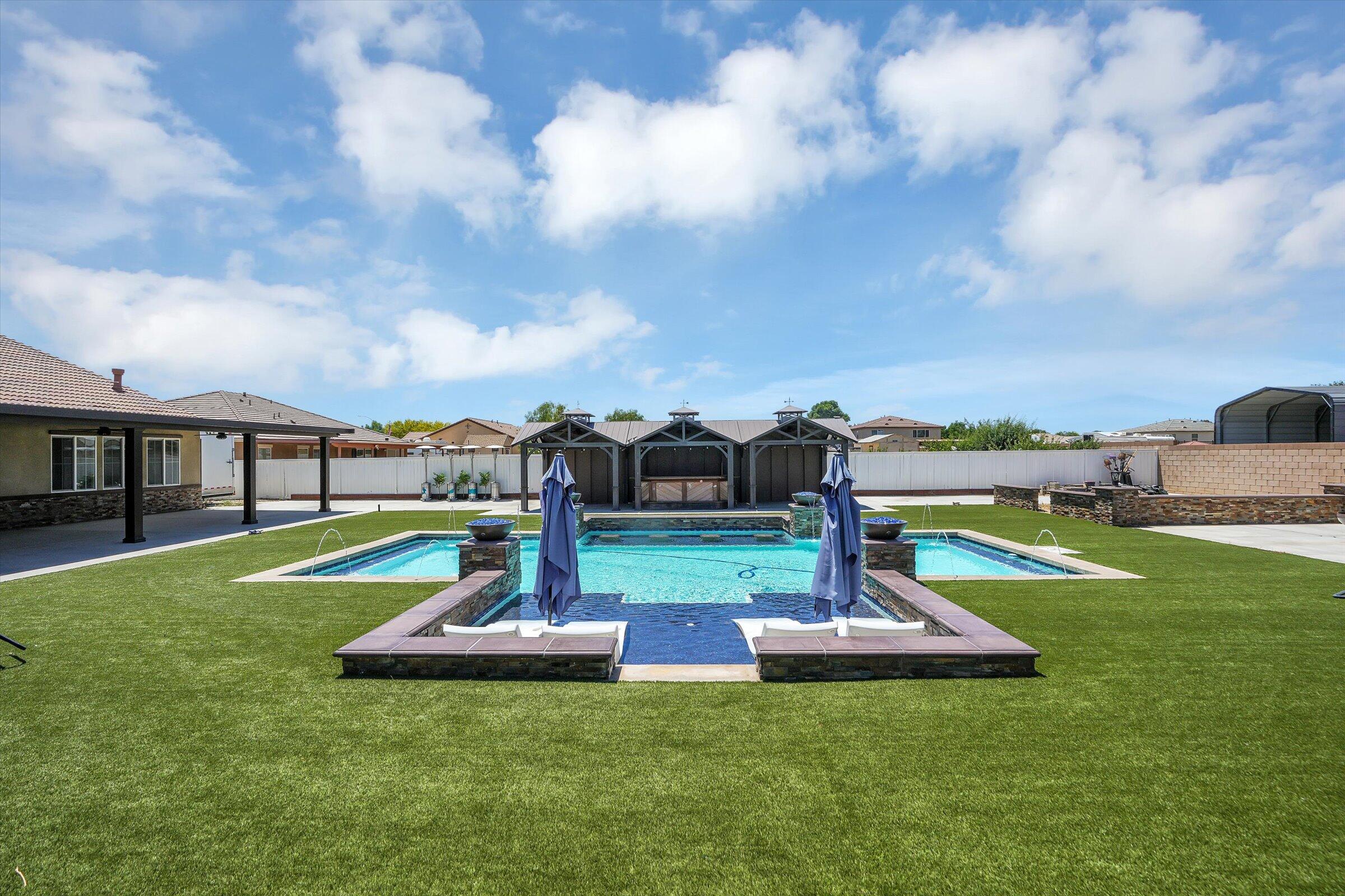 1635 Whitlatch Drive Lancaster, CA 93535 - Photo 44 of 58 a view of a garden with a slide