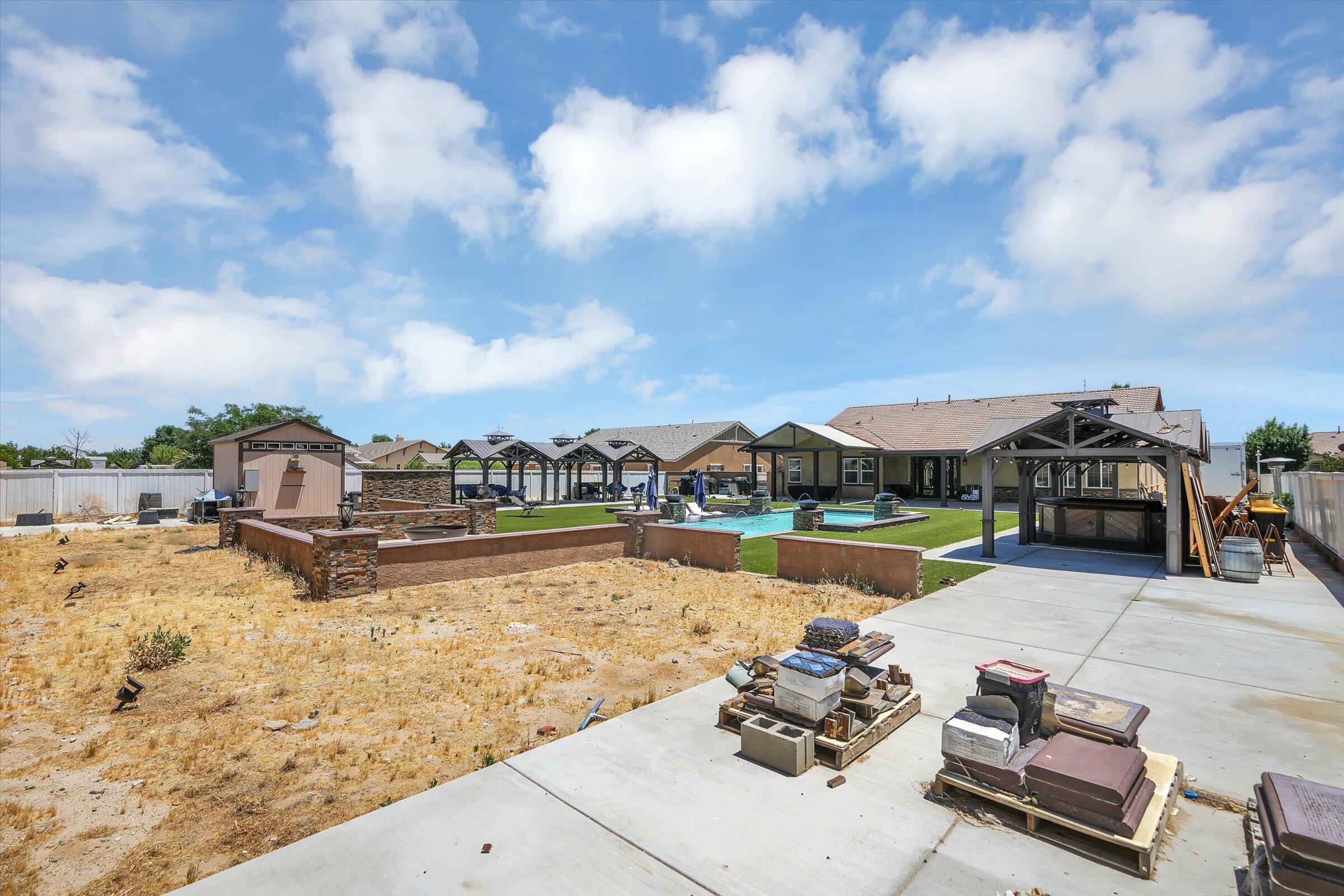 1635 Whitlatch Drive Lancaster, CA 93535 - Photo 48 of 58 a view of a lake with couches and city view