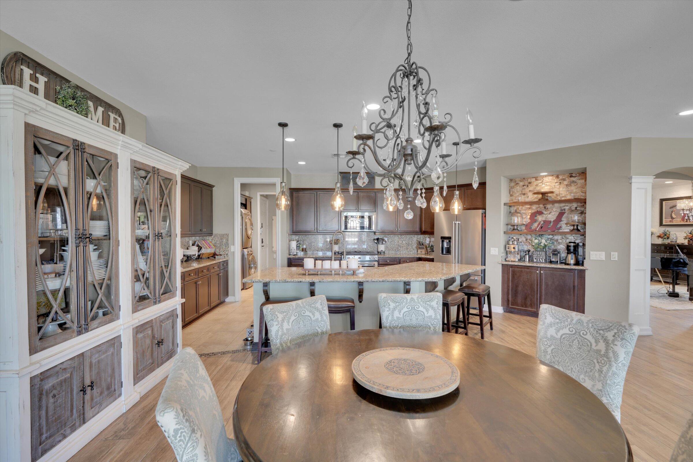 1635 Whitlatch Drive Lancaster, CA 93535 - Photo 9 of 58 a view of a dining room with furniture and chandelier