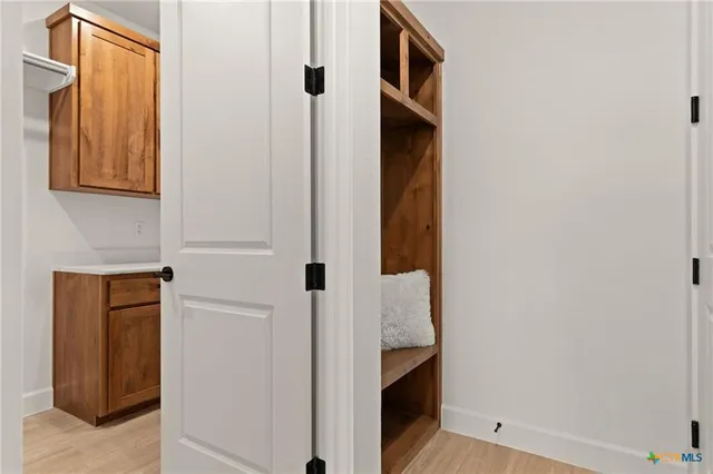 a view of kitchen and utility room