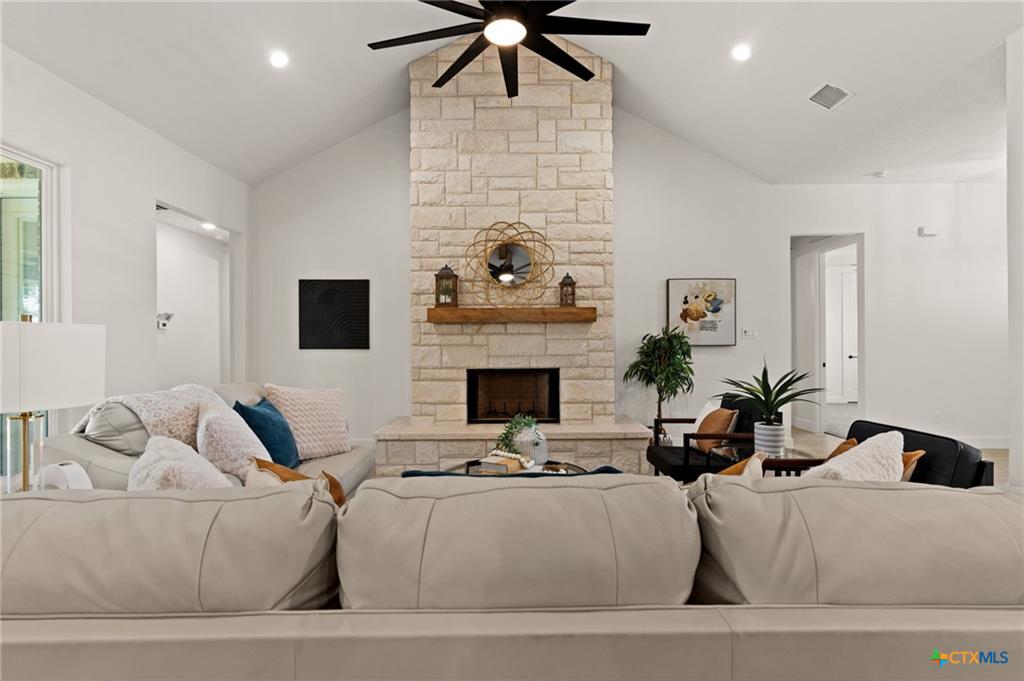 4237 Cold Springs Road Kempner, TX 76539 - Photo 8 of 33 Living area with ceiling fan, a fireplace, high vaulted ceiling, and recessed lighting