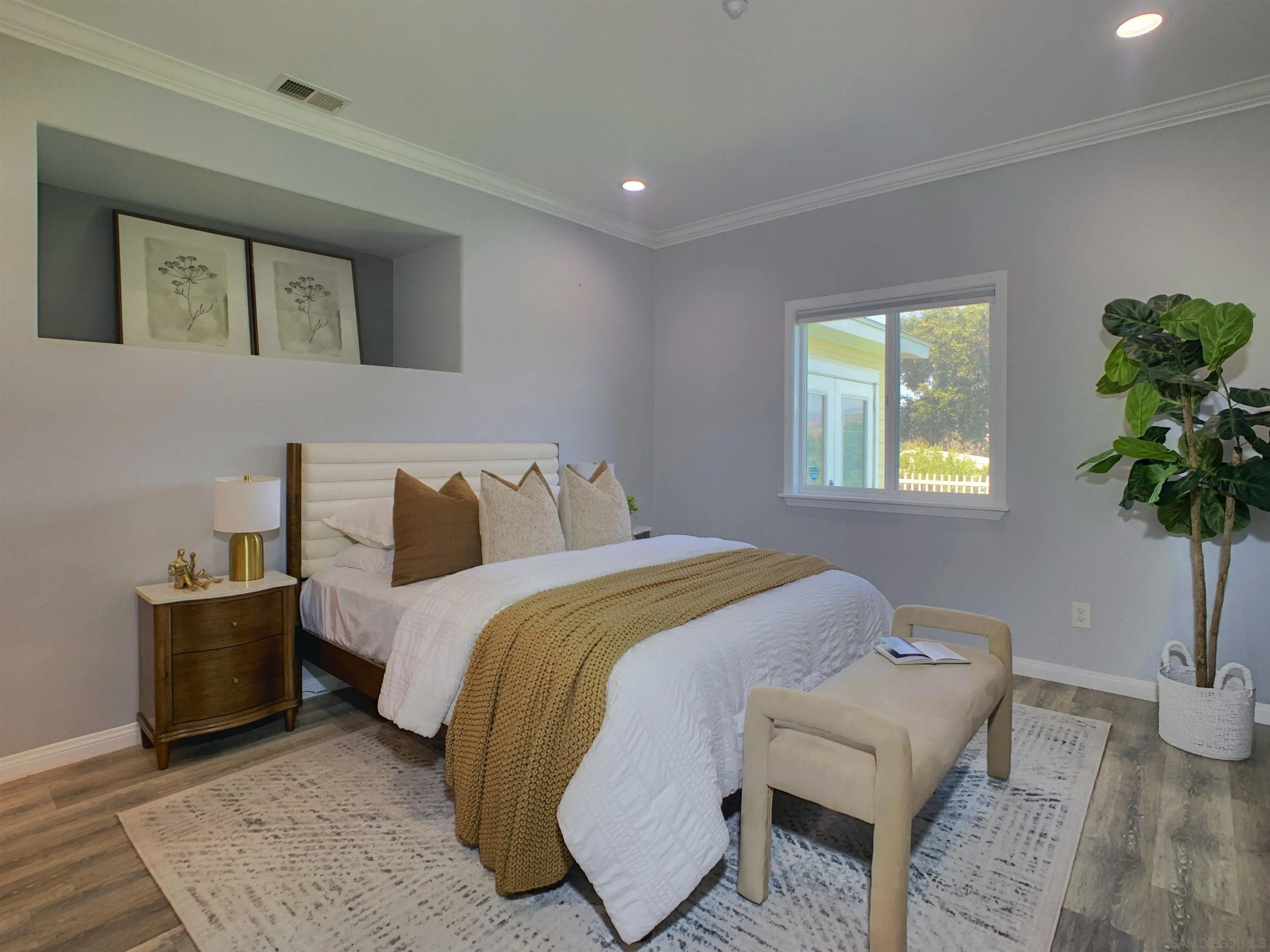 205 Highline Trail El Cajon, CA 92021 - Photo 28 of 45 a bedroom with bed and a potted plant
