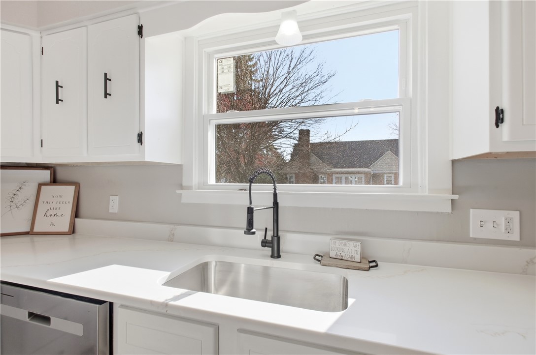 1925 Sunset Avenue Springfield, OH 45505 - Photo 20 of 45 Bright and airy kitchen features sleek countertops and modern fixtures for comfortable living.