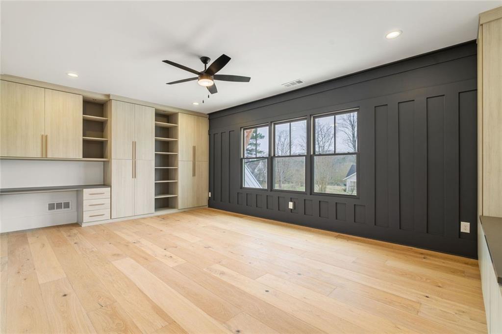 555 Lower Birmingham Road Canton, GA 30115 - Photo 80 of 104 a view of an empty room with a window and kitchen view