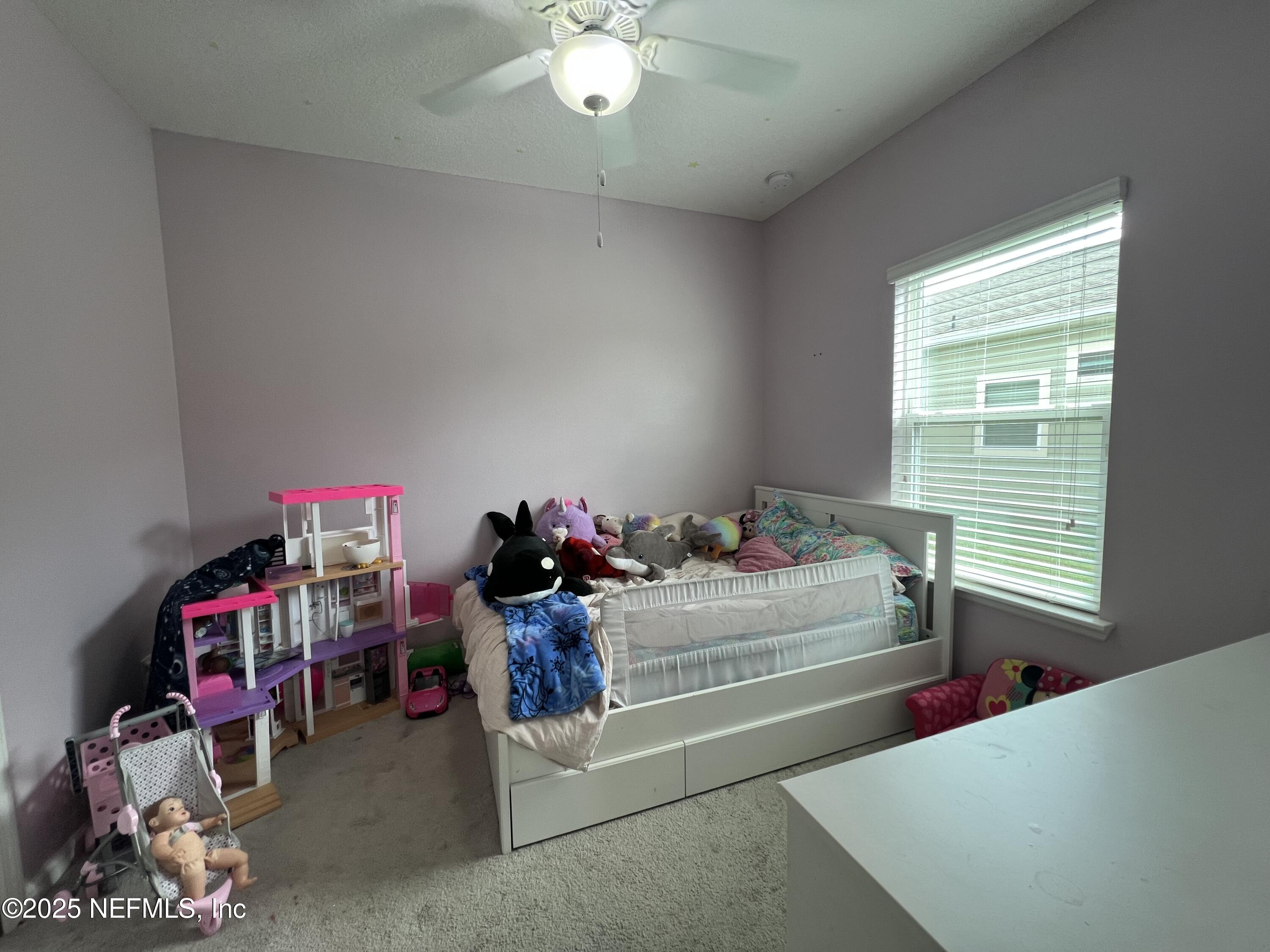 128 Ash Breeze Cove St. Augustine, FL 32095 - Photo 17 of 57 a view of kids room with toys