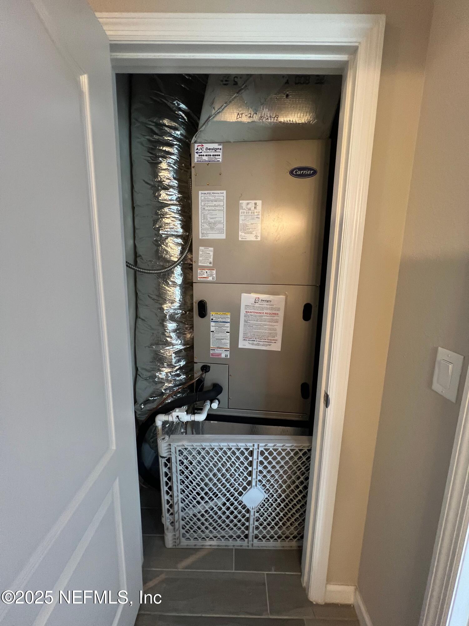 128 Ash Breeze Cove St. Augustine, FL 32095 - Photo 23 of 57 a view of wooden door