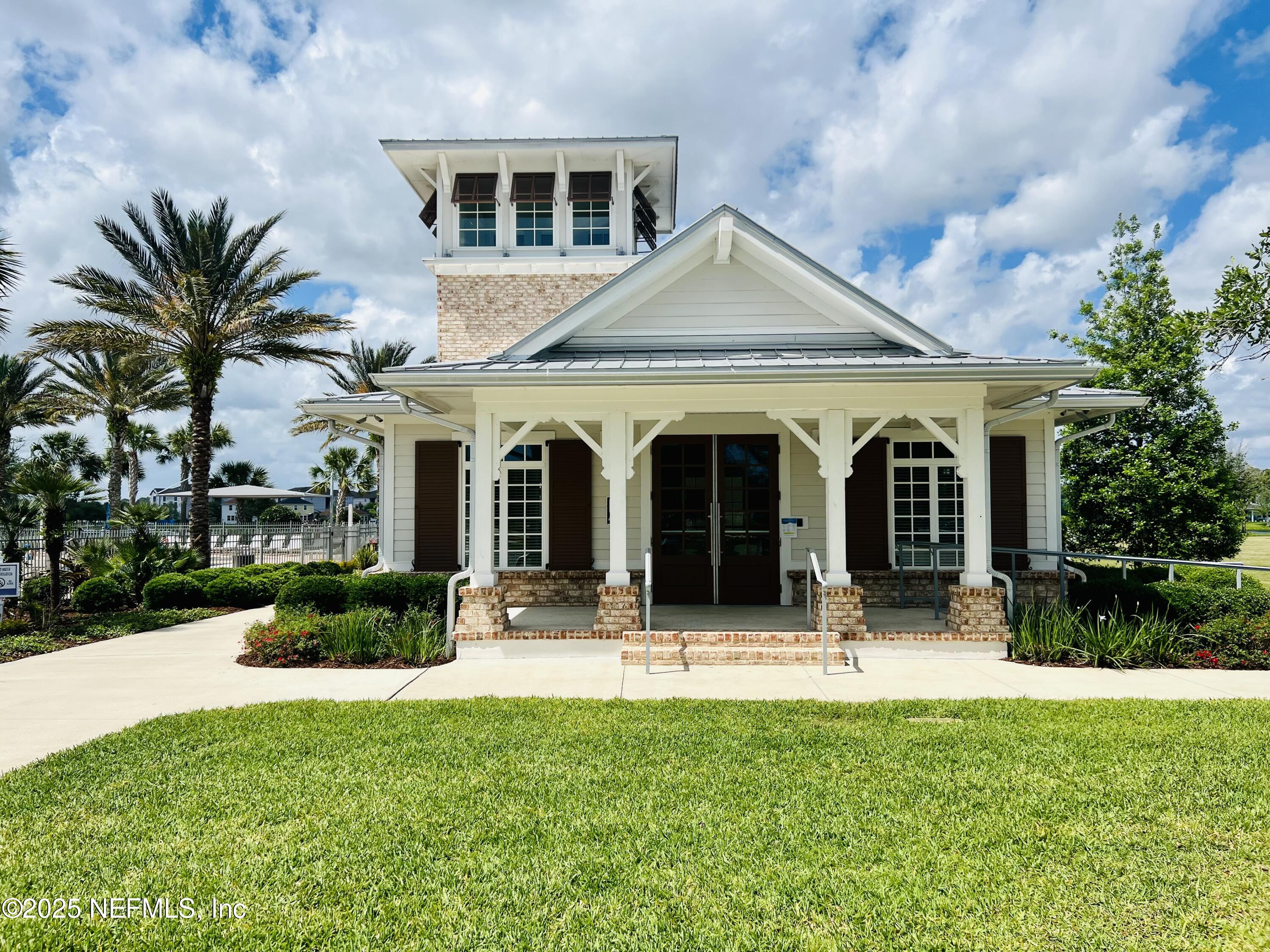 128 Ash Breeze Cove St. Augustine, FL 32095 - Photo 47 of 57 a view of a house with yard and plants