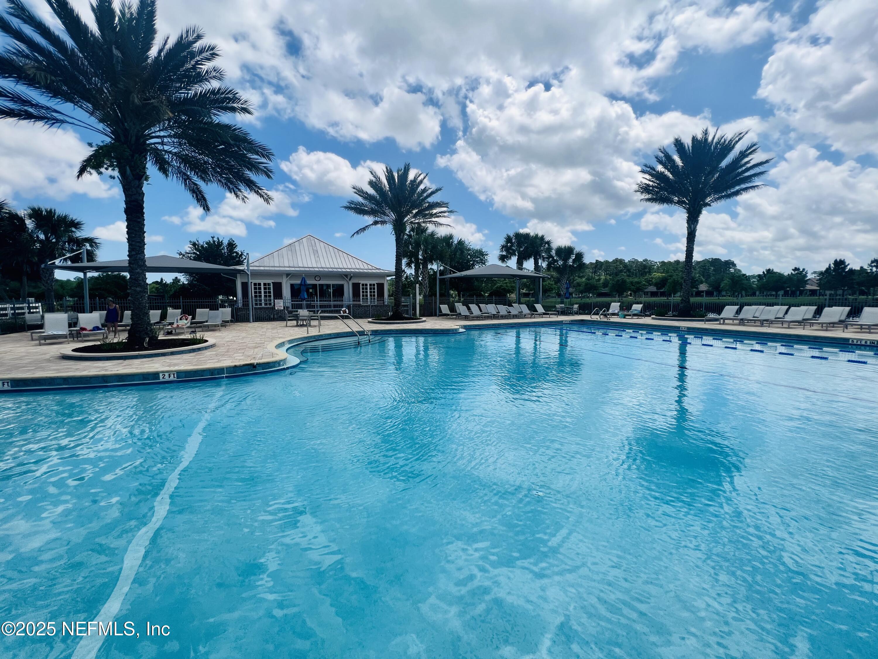 128 Ash Breeze Cove St. Augustine, FL 32095 - Photo 49 of 57 a view of a lake with houses